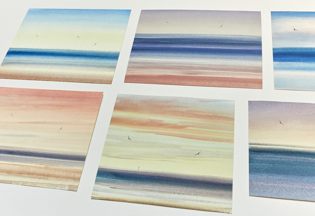 A selection of seascape paintings arranged together to compare their colours and styles